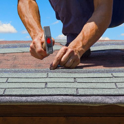 Roof Repair With Nail & Hammer